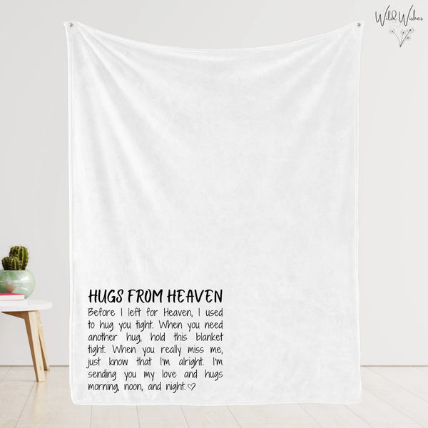 Cozy soft white 'Hugs from Heaven' memorial blanket hanging to display poem in left corner.